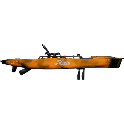 A side view of the 2023 Hobie Mirage Pro Angler 14 pedal drive kayak in the Sunrise Camo color. The manufacturer part number is 27100048 and the manufacturer UPC is 792176290131