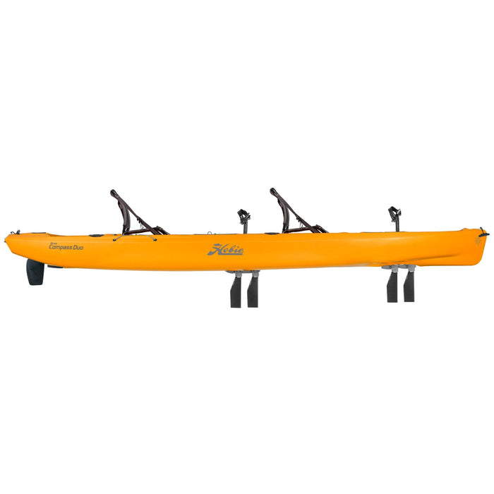 A side view of a 2023 Hobie Mirage Compass Duo Tandem (Two Seat) kayak in the papaya orange color. The manufacturer part number is 81912230 and the manufacturer UPC is 792176945352